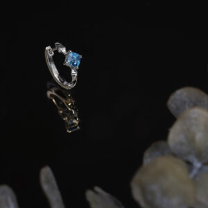 Custom-made blue zircon men's earring, to be worn on one side only.