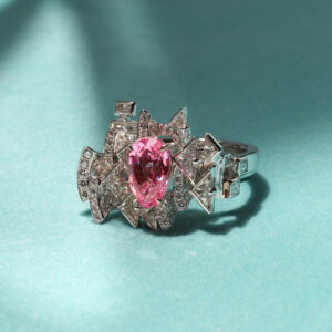 Vivid-neon pink spinel and diamond bespoke ring.
