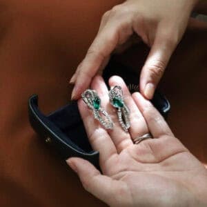 emerald gemstone earrings with diamonds