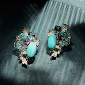Pair of custom made Turquoise earrings featuring beautiful carvings
