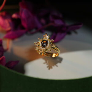 bespoke Alexandrite ring, Observe the fiery red glow at the centre, sparkling with a subtle hint of ultra-violet light