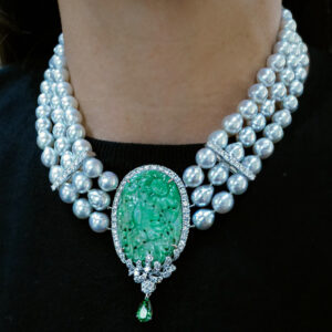 A Superb quality Jade sits among pearl strands in our luminous bespoke choker