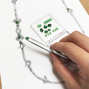 Calla Lily’s designer assembling a remarkable bespoke Tsavorite necklace.