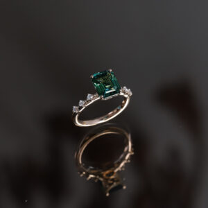 Green sapphire bespoke engagement ring
