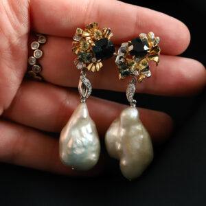 Modular earrings with baroque (irregular shaped) pearl dangles.