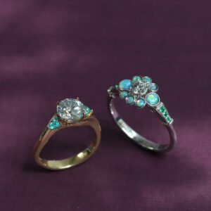 Diamond ring set with opals