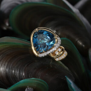 Custom-made blue topaz ring