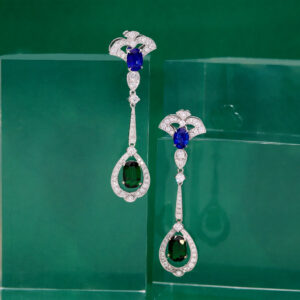 Art deco inspired customised earrings featuring Tsavorites and Sapphires.