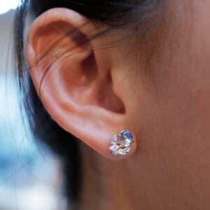 A delicate pairing of moonstones with diamond jackets