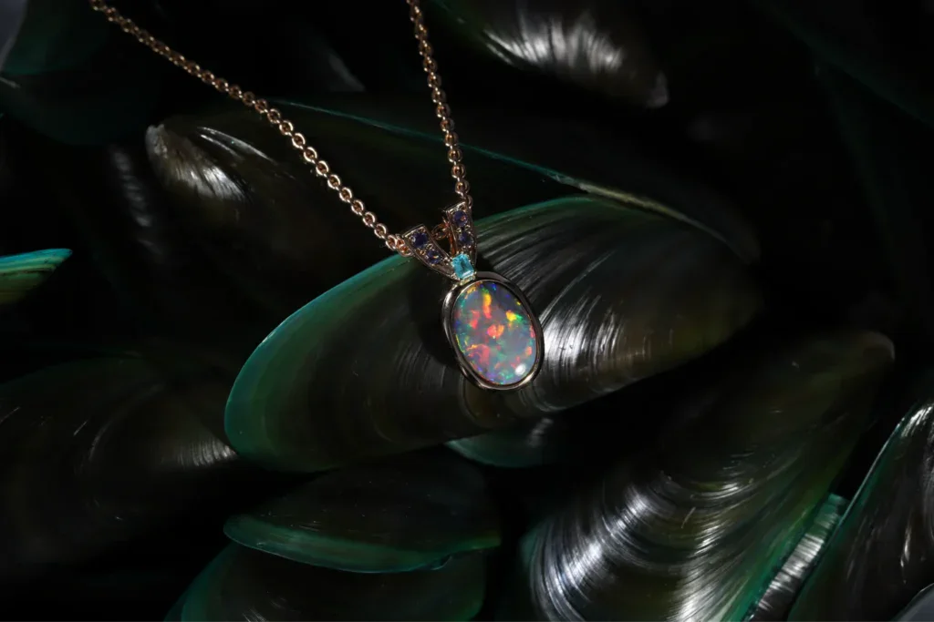 A bezel set opal pendant
