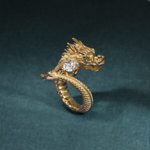 Custom diamond and gold dragon ring.