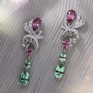 A dreamy mix of malaia garnet and lagoon tourmaline in bespoke earrings.