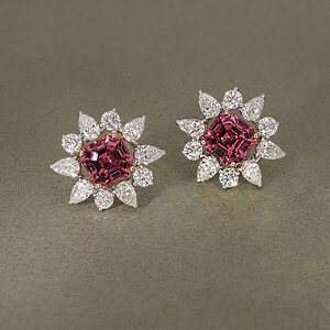 The gripping shine of malaia garnets in bespoke earrings.