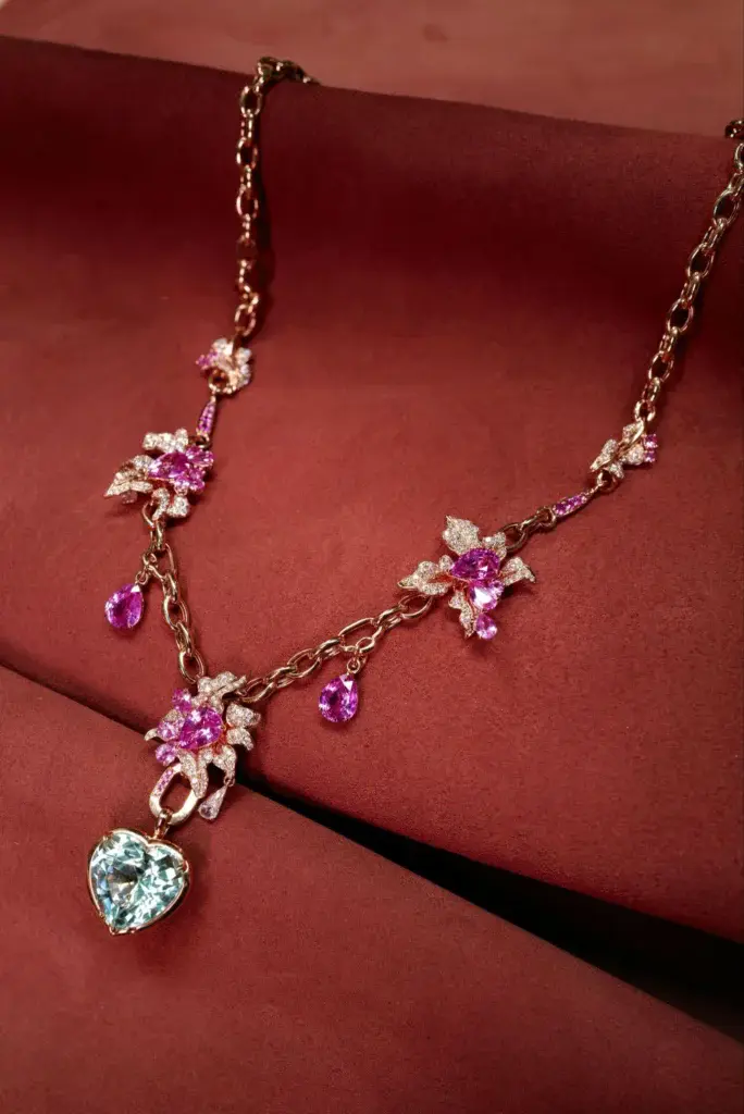 Pink sapphire flowers with diamond encrusted petals - one of our favorite pieces we’ve created