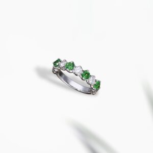 Cross tsavorite pendant Singapore crafted by bespoke jeweller featuring fine diamond and gemstone artistry